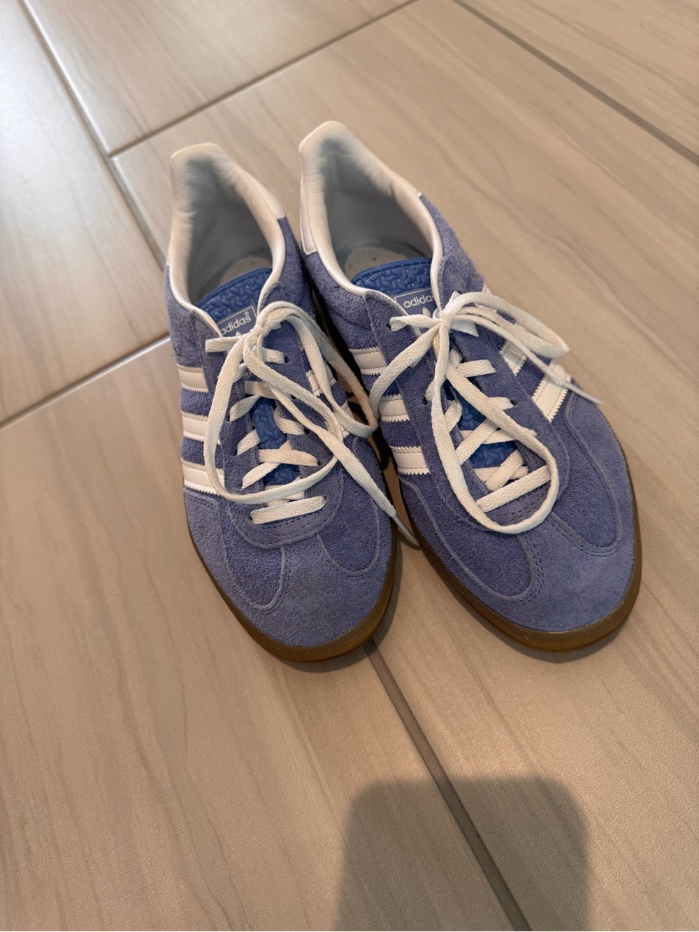 adidas women’s light blue Suede Sneakers with White Stripes and Gum Sole